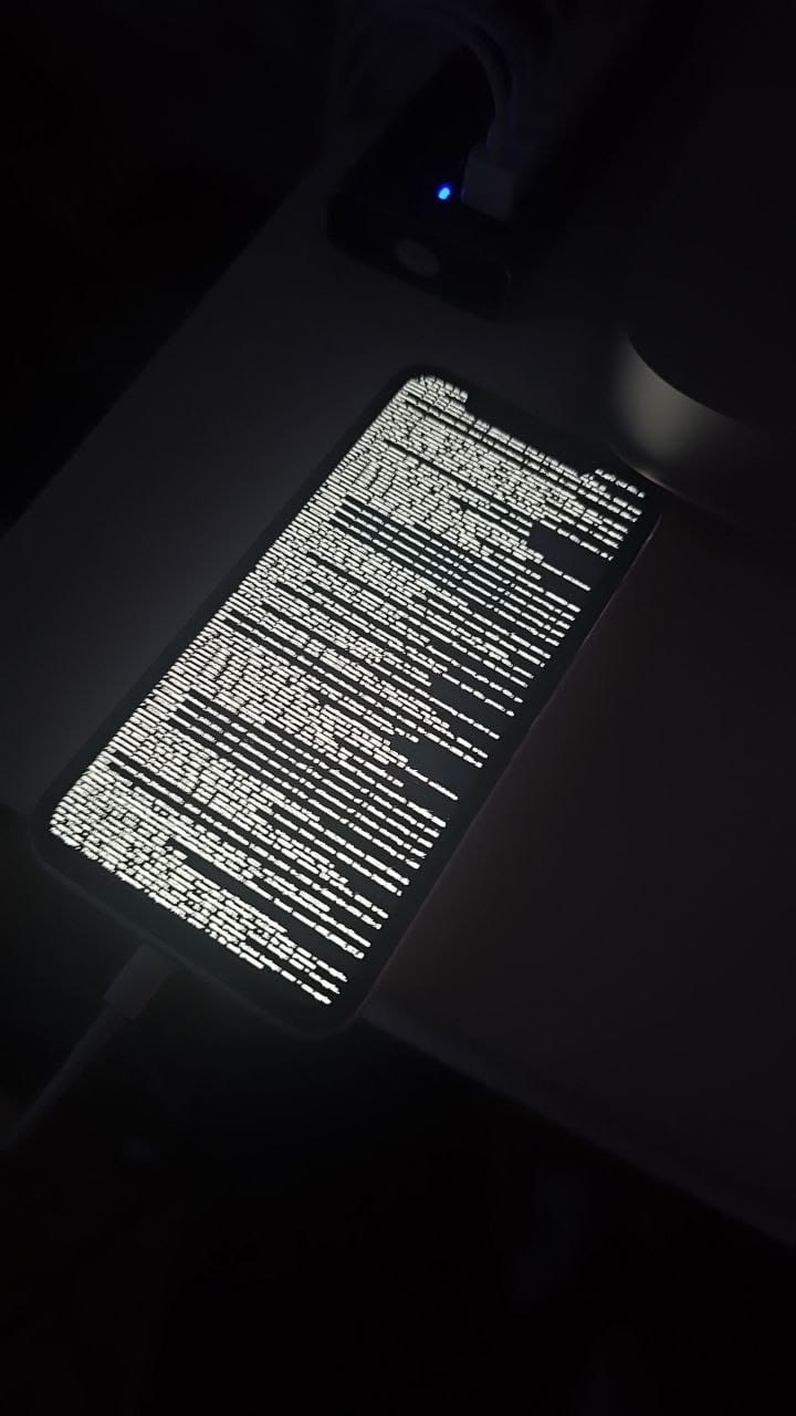 One of our farm iPhones mid-jailbreak, streaming its boot log